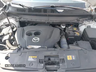 2022 Mazda CX-9 Touring Plus with VIN JM3TCBAY3N0626046, listed as a IAAI auction lot 42170265 with 21,823 mi miles and . Bid and sale history available at DreamBid. Image 10.