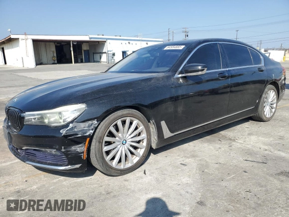 2017 BMW 7 Series 740i with VIN WBA7E2C50HG739565, listed as a Copart auction lot 64584885 with 114,496 mi miles and Salvage title. Bid and sale history available at DreamBid. Image 1.
