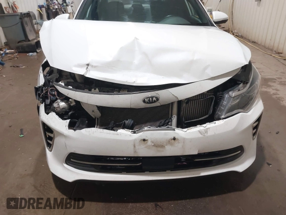2016 Kia Optima SXL Turbo with VIN 5XXGV4L21GG073147, listed as a IAAI auction lot 41504517 with 130,467 mi miles. Bid and sale history available at carsss.com. Image 6.