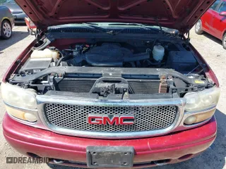 2004 GMC Yukon XL Denali with VIN 1GKFK66U94J211719, listed as a IAAI auction lot 41928515 with 133,073 mi miles. Bid and sale history available at carsss.com. Image 10.