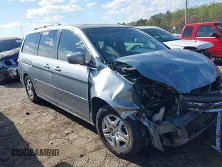 2007 Honda Odyssey EX-L with VIN 5FNRL38677B054173, listed as a IAAI auction lot 41888792 with 142,438 mi miles and . Bid and sale history available at DreamBid. Image 1.