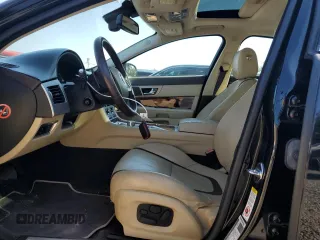 2015 Jaguar XF V6 Portfolio with VIN SAJWJ0FFXF8U60040, listed as a Copart auction lot 52912695 with 112,618 mi miles and Salvage Title. Bid and sale history available at carsss.com. Image 7.