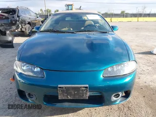 1999 Mitsubishi Eclipse GS-T with VIN 4A3AX55F6XE052978, listed as a IAAI auction lot 41841812 with 92,776 mi miles and . Bid and sale history available at carsss.com. Image 12.