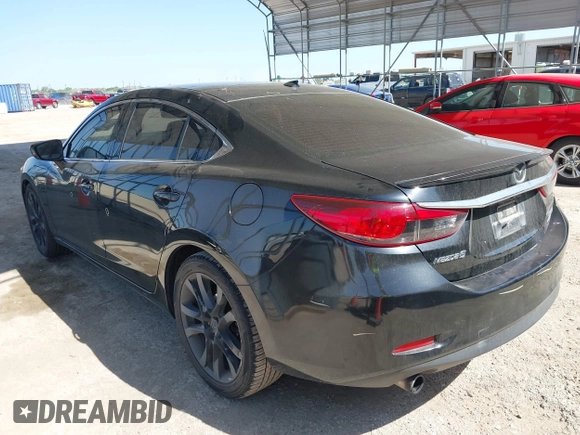 2015 Mazda 6 i Grand Touring with VIN JM1GJ1W59F1179548, listed as a IAAI auction lot 42004860 with 153,532 mi miles and . Bid and sale history available at DreamBid. Image 3.