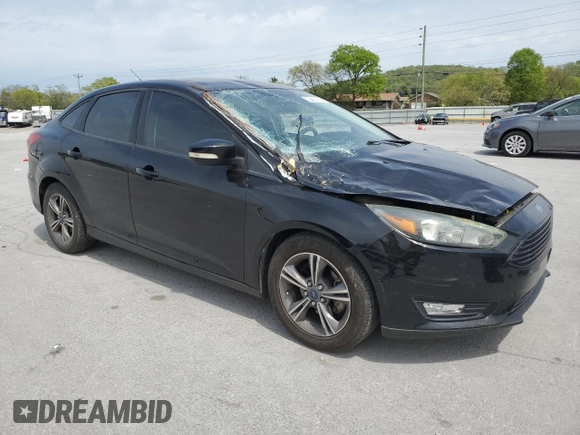 2017 Ford Focus SE with VIN 1FADP3FEXHL281886, listed as a Copart auction lot 53457455 with 84,228 mi miles and Salvage Title. Bid and sale history available at carsss.com. Image 4.