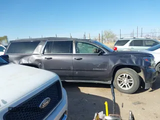 2015 Chevrolet Suburban LT with VIN 1GNSKJKCXFR701284, listed as a IAAI auction lot 41756059 with 168,397 mi miles. Bid and sale history available at carsss.com. Image 13.