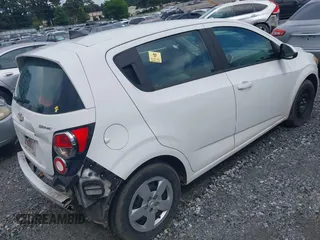 2015 Chevrolet Sonic LS with VIN 1G1JA6SH3F4207922, listed as a IAAI auction lot 42434022 with 123,459 mi miles and . Bid and sale history available at DreamBid. Image 4.