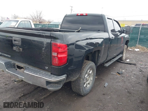 2014 Chevrolet Silverado 1500 LT with VIN 1GCVKREC3EZ149707, listed as a IAAI auction lot 41524452 with 128,338 mi miles and . Bid and sale history available at DreamBid. Image 4.