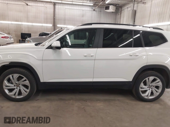2021 Volkswagen Atlas SE z VIN 1V2HR2CA3MC539997, wystawiony jako IAAI lot #41977786 z przebiegiem 77 372 mil mil oraz . Historia ofert i sprzedaży dostępna na DreamBid. Obrazek 15.
