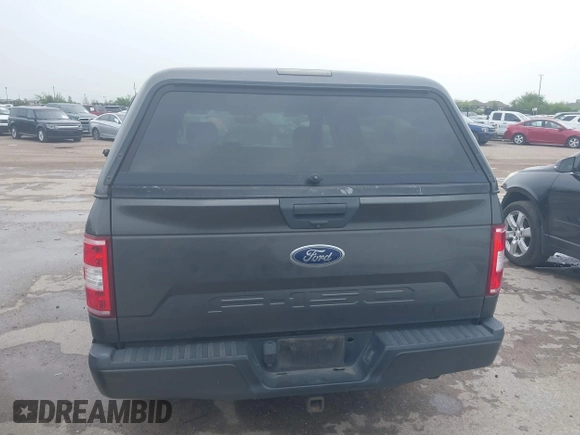 2018 Ford F-150 XL with VIN 1FTMF1C53JKE85608, listed as a IAAI auction lot 41823771 with 142,151 mi miles. Bid and sale history available at carsss.com. Image 16.