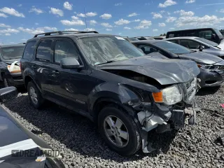 2008 Ford Escape XLS с VIN 1FMCU02Z08KB06103, выставлен на аукционе Copart как лот 60934415 с пробегом Не указан миль и Списание • Salvage title. История ставок и продаж доступна на DreamBid. Изображение 4.