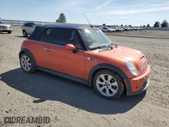 2005 MINI Convertible S with VIN WMWRH33485TF81057, listed as a Copart auction lot 53290165 with 95,123 mi miles and Salvage Title. Bid and sale history available at DreamBid. Image 4.