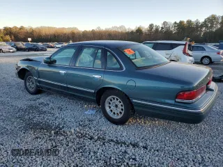 1996 Ford Crown Victoria LX z VIN 2FALP74W0TX205507, wystawiony jako Copart lot #85310874 z przebiegiem 51 646 mil mil oraz Szkoda całkowita • Salvage title. Historia ofert i sprzedaży dostępna na DreamBid. Obrazek 2.