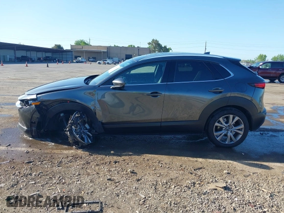 2022 Mazda CX-30 S Premium with VIN 3MVDMBDL0NM413867, listed as a IAAI auction lot 42082560 with 12,375 mi miles and . Bid and sale history available at DreamBid. Image 14.