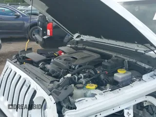 2020 Jeep Wrangler Sport S with VIN 1C4GJXAN3LW121976, listed as a IAAI auction lot 43074171 with 19,927 mi miles and . Bid and sale history available at DreamBid. Image 22.