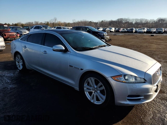 2013 Jaguar XJ Portfolio with VIN SAJWJ2GD3D8V47266, listed as a Copart auction lot 46824695 with 157,151 mi miles and Salvage title. Bid and sale history available at DreamBid. Image 4.