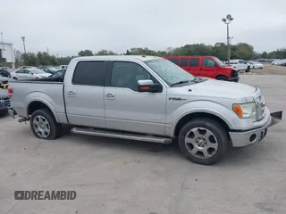 2012 Ford F-150 XL with VIN 1FTFW1CT2CKD51232, listed as a IAAI auction lot 41497343 with 300,216 mi miles. Bid and sale history available at carsss.com. Image 13.