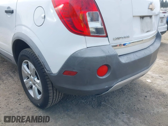 2014 Chevrolet Captiva Sport LS z VIN 3GNAL2EK7ES547033, wystawiony jako IAAI lot #42206186 z przebiegiem 196 530 mil mil oraz . Historia ofert i sprzedaży dostępna na DreamBid. Obrazek 6.