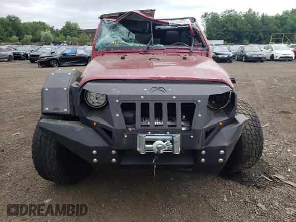 2012 Jeep Wrangler Unlimited Sport with VIN 1C4BJWDG6CL234419, listed as a Copart auction lot 62284825 with 66,649 mi miles and Salvage title. Bid and sale history available at DreamBid. Image 5.
