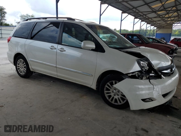 2010 Toyota Sienna XLE with VIN 5TDYK4CCXAS335064, listed as a Copart auction lot 62649665 with 246,327 mi miles and Salvage title. Bid and sale history available at DreamBid. Image 4.