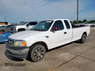 2001 Ford F-150 XL z VIN 1FTRX17W21NB39585, wystawiony jako Copart lot #55212865 z przebiegiem 387 563 mil mil oraz Czysty tytuł • Clean title. Historia ofert i sprzedaży dostępna na DreamBid. Obrazek 1.