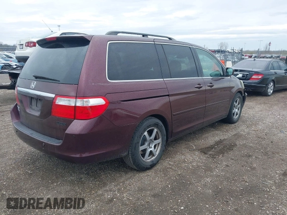2007 Honda Odyssey Touring with VIN 5FNRL38847B048235, listed as a IAAI auction lot 41963652 with 176,412 mi miles. Bid and sale history available at carsss.com. Image 4.