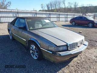 1992 Cadillac Seville z VIN 1G6EL13B2N0612154, wystawiony jako IAAI lot #41757101 z przebiegiem Nie podano mil oraz . Historia ofert i sprzedaży dostępna na DreamBid. Obrazek 1.