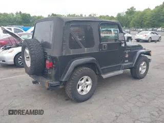 2001 Jeep Wrangler Sahara with VIN 1J4FA59S41P376079, listed as a IAAI auction lot 42739280 with 255,999 mi miles and . Bid and sale history available at DreamBid. Image 4.