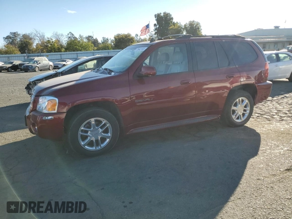 2007 GMC Envoy Denali with VIN 1GKET63MX72135942, listed as a Copart auction lot 77642184 with 166,742 mi miles and Clean Title. Bid and sale history available at DreamBid. Image 1.