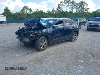 2022 Mazda CX-30 S Select with VIN 3MVDMBBL6NM448268, listed as a IAAI auction lot 42242290 with Not provided miles and . Bid and sale history available at DreamBid. Image 18.