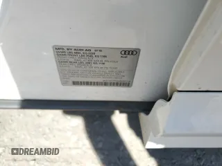 2016 Audi Q3 Prestige with VIN WA1GFCFS5GR004116, listed as a Copart auction lot 57690675 with 122,081 mi miles and Salvage title. Bid and sale history available at DreamBid. Image 12.