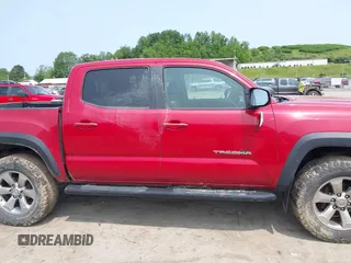 2017 Toyota Tacoma SR5 z VIN 3TMCZ5AN5HM066093, wystawiony jako IAAI lot #42370102 z przebiegiem 115 327 mil mil oraz . Historia ofert i sprzedaży dostępna na DreamBid. Obrazek 13.