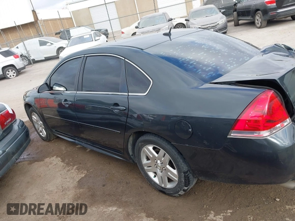 2014 Chevrolet Impala LT with VIN 2G1WB5E35E1123415, listed as a IAAI auction lot 41101111 with 129,870 mi miles and . Bid and sale history available at DreamBid. Image 14.