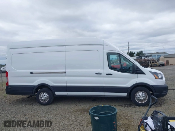 2024 Ford Transit Cargo z VIN 1FTBR3U86RKA14633, wystawiony jako IAAI lot #42500581 z przebiegiem 16 529 mil mil oraz . Historia ofert i sprzedaży dostępna na DreamBid. Obrazek 13.