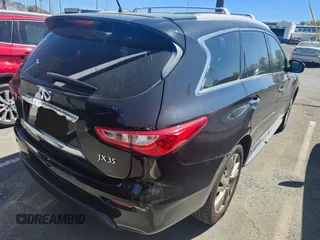 2013 Infiniti JX35 z VIN 5N1AL0MMXDC328874, wystawiony jako IAAI lot #41928856 z przebiegiem 153 605 mil mil oraz . Historia ofert i sprzedaży dostępna na DreamBid. Obrazek 4.