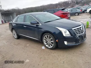2015 Cadillac XTS Luxury z VIN 2G61M5S33F9196904, wystawiony jako IAAI lot #41675294 z przebiegiem 59 957 mil mil oraz . Historia ofert i sprzedaży dostępna na DreamBid. Obrazek 1.