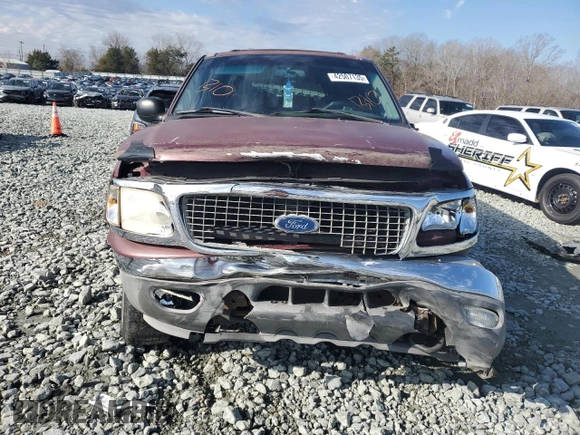 2000 Ford Expedition XLT with VIN 1FMRU166XYLA82466, listed as a Copart auction lot 42507135 with 214,014 mi miles and Salvage Title. Bid and sale history available at DreamBid. Image 5.