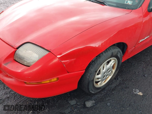 1999 Pontiac Sunfire SE z VIN 1G2JB5248X7528290, wystawiony jako IAAI lot #42252324 z przebiegiem 156 758 mil mil oraz . Historia ofert i sprzedaży dostępna na DreamBid. Obrazek 6.