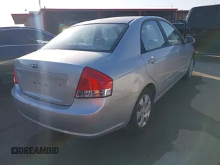 2009 Kia Spectra EX with VIN KNAFE221795620189, listed as a IAAI auction lot 41946984 with 131,913 mi miles. Bid and sale history available at carsss.com. Image 4.
