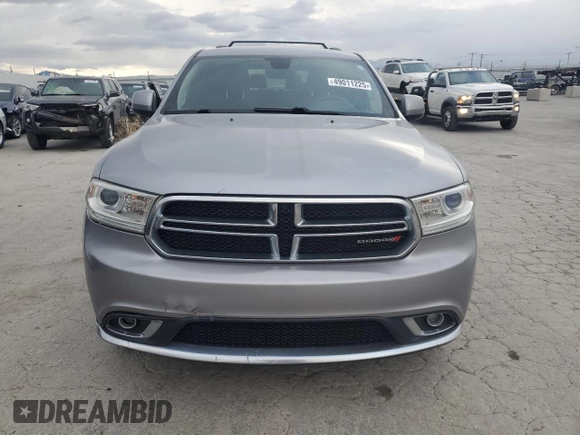 2017 Dodge Durango SXT with VIN 1C4RDJAG4HC871572, listed as a Copart auction lot 49011225 with 137,326 mi miles and Salvage title. Bid and sale history available at DreamBid. Image 5.
