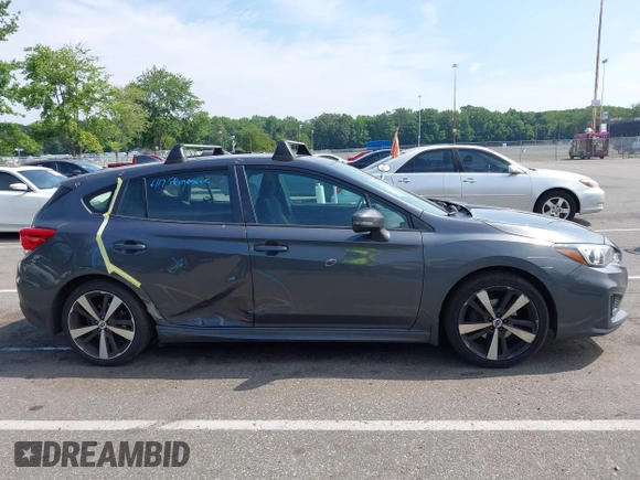 2018 Subaru Impreza Special Sports with VIN 4S3GTAM62J3702931, listed as a IAAI auction lot 42615234 with 111,272 mi miles and . Bid and sale history available at DreamBid. Image 12.