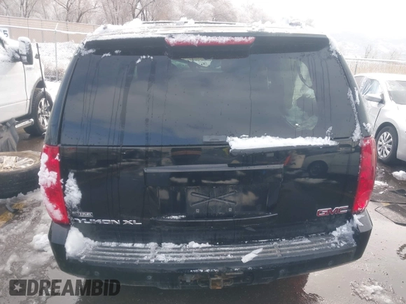 2007 GMC Yukon XL SLT with VIN 1GKFK16377R377124, listed as a IAAI auction lot 41808174 with 217,584 mi miles. Bid and sale history available at carsss.com. Image 16.