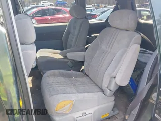 2002 Toyota Sienna LE with VIN 4T3ZF13C32U456123, listed as a IAAI auction lot 42084436 with 242,408 mi miles. Bid and sale history available at carsss.com. Image 8.