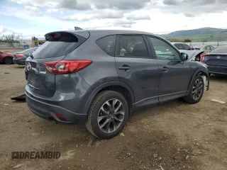 2016 Mazda CX-5 Grand Touring with VIN JM3KE2DY4G0795271, listed as a Copart auction lot 50986845 with 92,323 mi miles and Salvage Title. Bid and sale history available at carsss.com. Image 3.