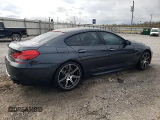 2016 BMW M6 z VIN WBS6E9C59GG437111, wystawiony jako Copart lot #44711734 z przebiegiem 79 471 mil mil oraz . Historia ofert i sprzedaży dostępna na DreamBid. Obrazek 3.