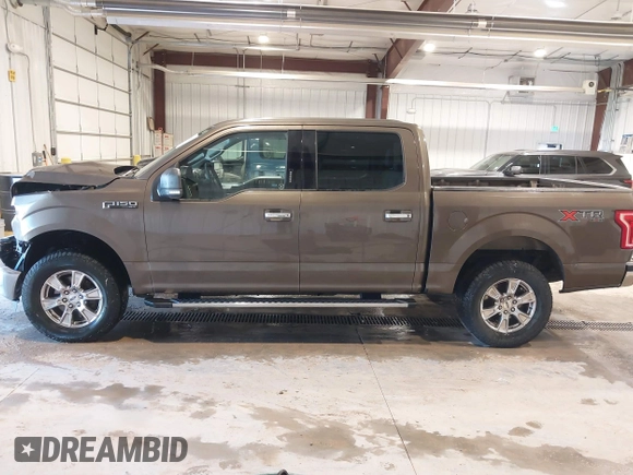 2015 Ford F-150 XLT with VIN 1FTEW1EFXFFB14990, listed as a IAAI auction lot 41681520 with 121,255 mi miles. Bid and sale history available at carsss.com. Image 15.