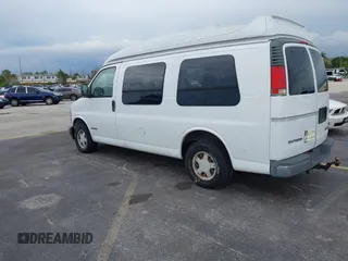 1999 Chevrolet Express with VIN 1GBFG15R5X1075479, listed as a IAAI auction lot 41729007 with 113,579 mi miles and . Bid and sale history available at carsss.com. Image 3.