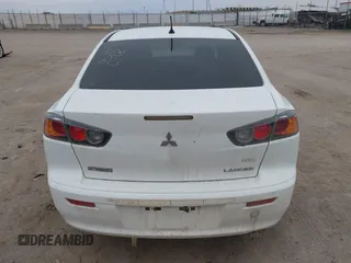 2014 Mitsubishi Lancer ES with VIN JA32U2FU4EU002366, listed as a IAAI auction lot 41942673 with 117,934 mi miles. Bid and sale history available at carsss.com. Image 16.