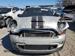 2014 MINI Coupe S z VIN WMWSX3C57ET409158, wystawiony jako Copart lot #81650034 z przebiegiem 118 523 mil mil oraz Szkody całkowita. Historia ofert i sprzedaży dostępna na DreamBid. Obrazek 5.