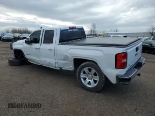 2019 GMC Sierra 1500 SLE z VIN 2GTV2MEC0K1170652, wystawiony jako Copart lot #53474495 z przebiegiem 58 181 mil mil oraz Czysty tytuł • Clean title. Historia ofert i sprzedaży dostępna na DreamBid. Obrazek 2.